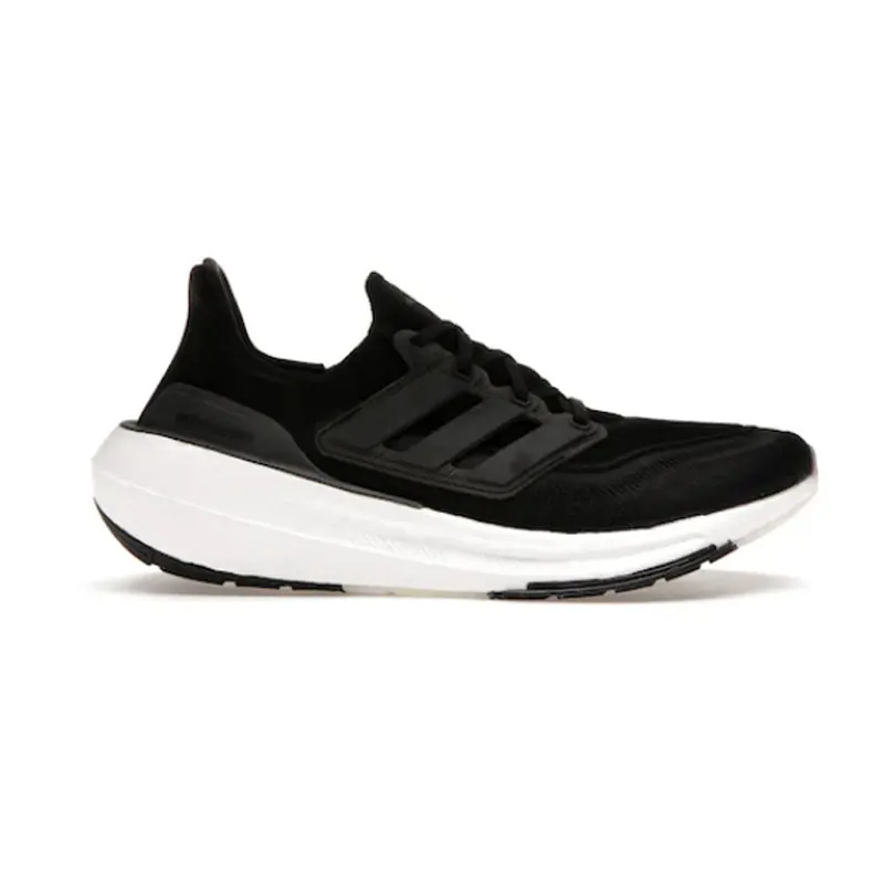 Side view of a black running shoe from a checked product listing
